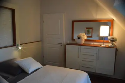 Ein Bett oder Betten in einem Zimmer der Unterkunft Friedenstr 20 b Les Belles Haus Davide Wg 11 