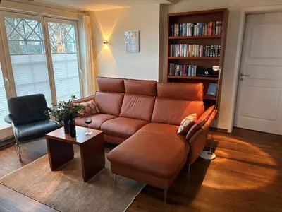 Ein Sitzbereich in der Unterkunft Friedenstr 20 b Les Belles Haus Davide Wg 11 
