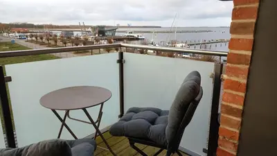 Ein Balkon oder eine Terrasse in der Unterkunft Apartment Hafenkante