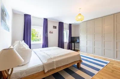 Ein Bett oder Betten in einem Zimmer der Unterkunft Dat lütt Eenhoorn