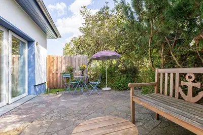 Ein Garten an der Unterkunft Dat lütt Eenhoorn