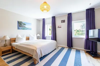 Ein Bett oder Betten in einem Zimmer der Unterkunft Dat lütt Eenhoorn