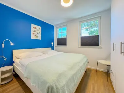 Ein Bett oder Betten in einem Zimmer der Unterkunft Clownfisch