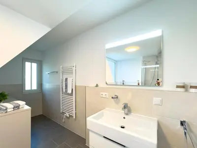 Ein Badezimmer in der Unterkunft Störtebekerkoje 12a 6