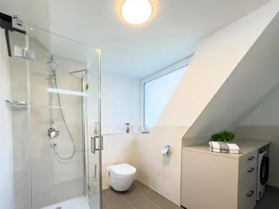 Ein Badezimmer in der Unterkunft Störtebekerkoje 12a 6