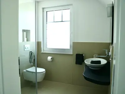 Ein Badezimmer in der Unterkunft Yvette 2 - Meer, Sand, Zingst - Ihr Urlaubsparadies