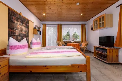 Ein Bett oder Betten in einem Zimmer der Unterkunft Am Bodden Krapp´s - Apartment