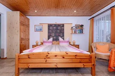 Ein Bett oder Betten in einem Zimmer der Unterkunft Am Bodden Krapp´s - Apartment