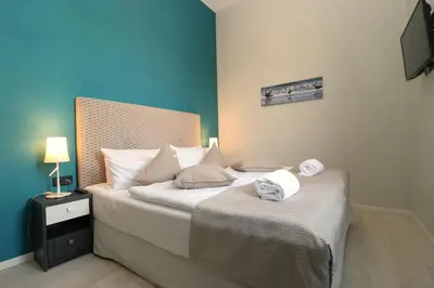 Ein Bett oder Betten in einem Zimmer der Unterkunft Alte Seefahrtschule App 09 