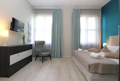 Ein Bett oder Betten in einem Zimmer der Unterkunft Alte Seefahrtschule App 15 