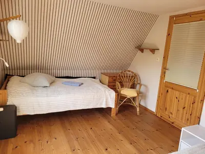 Ein Bett oder Betten in einem Zimmer der Unterkunft House Siggi & Frank