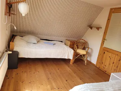 Ein Bett oder Betten in einem Zimmer der Unterkunft House Siggi & Frank