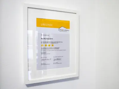 Ein Zertifikat, Auszeichnung, Logo oder anderes Dokument, das in der Unterkunft Am Kurhaus 614-Strandidyll Villa Kurpark ausgestellt ist