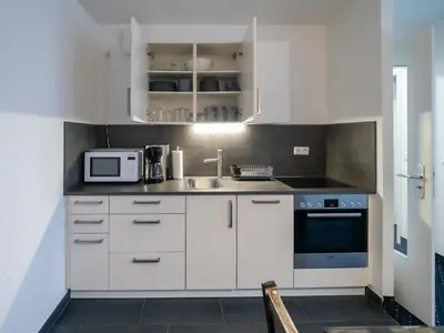 Küche/Küchenzeile in der Unterkunft Am Kurhaus 614-Strandidyll Villa Kurpark