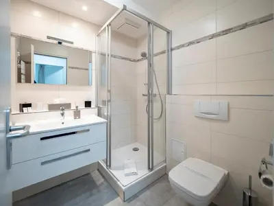 Ein Badezimmer in der Unterkunft Am Kurhaus 614-Strandidyll Villa Kurpark
