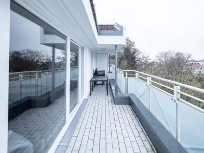 Ein Balkon oder eine Terrasse in der Unterkunft Am Kurhaus 614-Strandidyll Villa Kurpark