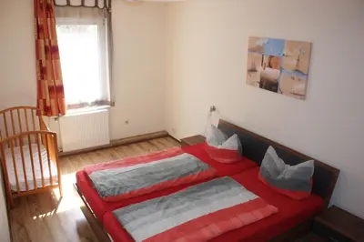 Ein Bett oder Betten in einem Zimmer der Unterkunft Schwalbe