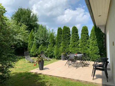 Ein Garten an der Unterkunft Schwalbe