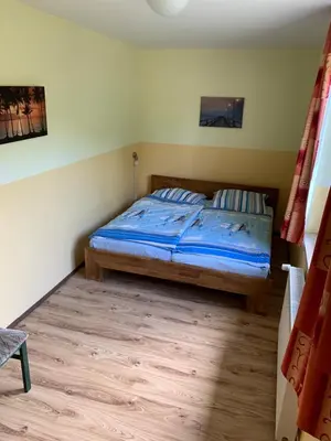 Ein Bett oder Betten in einem Zimmer der Unterkunft Schwalbe