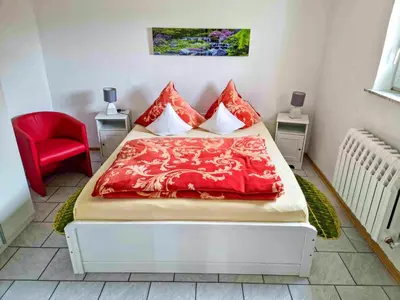 Ein Bett oder Betten in einem Zimmer der Unterkunft Ferienwohnung in Kenz-Küstrow