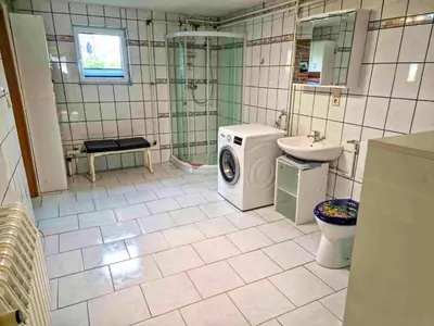 Ein Badezimmer in der Unterkunft Ferienwohnung in Kenz-Küstrow
