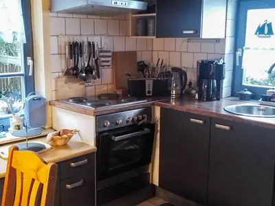 Küche/Küchenzeile in der Unterkunft Lütt Stuuv am Dorfanger