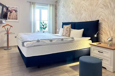 Ein Bett oder Betten in einem Zimmer der Unterkunft FeWo Muschelsucher