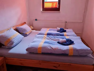 Ein Bett oder Betten in einem Zimmer der Unterkunft Ferienwohnung Kneip