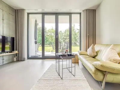 Ein Sitzbereich in der Unterkunft Ferienhaus in Fuhlendorf