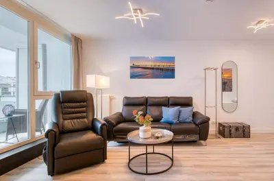 Ein Sitzbereich in der Unterkunft 5-Sterne-Ferienwohnung Ostseeglück Zingst inklusive Strandkorb von April-Oktober