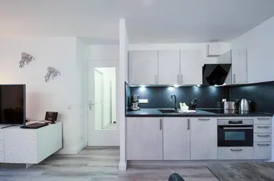 Küche/Küchenzeile in der Unterkunft 5-Sterne-Apartment Ostseeperle Zingst inklusive Strandkorb April-Oktober