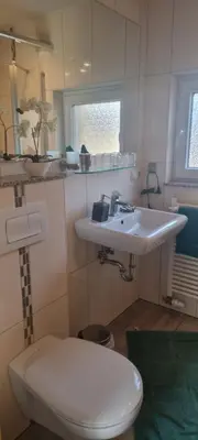 Ein Badezimmer in der Unterkunft Ostseekrabbe