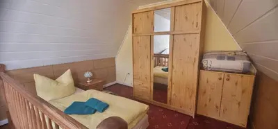 Ein Bett oder Betten in einem Zimmer der Unterkunft Ostseekrabbe