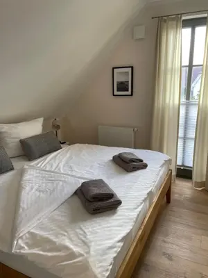 Ein Bett oder Betten in einem Zimmer der Unterkunft Zum Schwedenblick