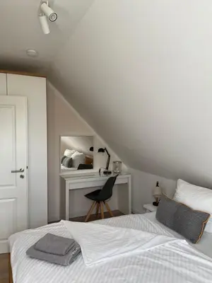 Ein Bett oder Betten in einem Zimmer der Unterkunft Zum Schwedenblick