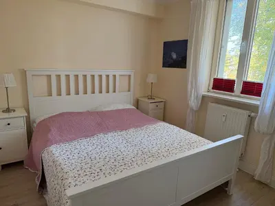 Ein Bett oder Betten in einem Zimmer der Unterkunft Ferienwohnung Möövnest