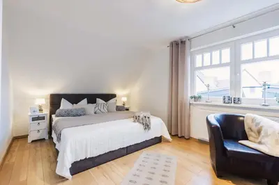 Ein Bett oder Betten in einem Zimmer der Unterkunft Villa Strandleben