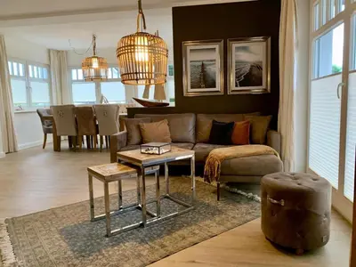 Ein Sitzbereich in der Unterkunft Villa Strandleben