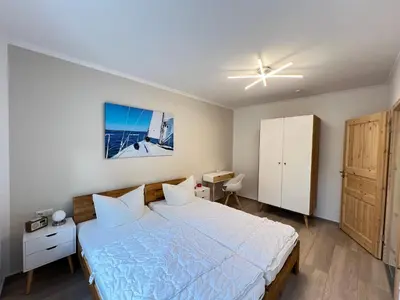 Ein Bett oder Betten in einem Zimmer der Unterkunft Fewo Barth 2