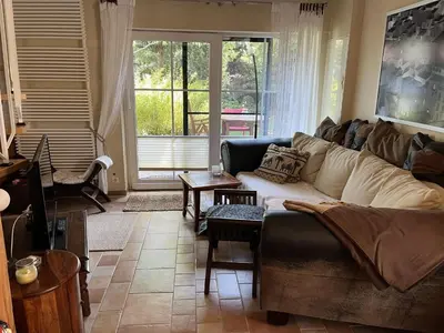 Ein Sitzbereich in der Unterkunft Boddenhus Fuhlendorf