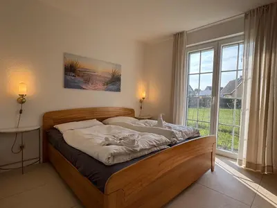 Ein Bett oder Betten in einem Zimmer der Unterkunft Sonnenblume