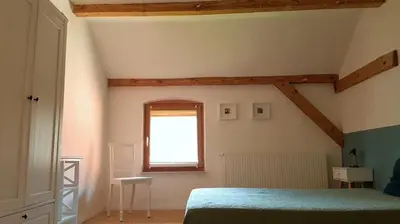 Ein Bett oder Betten in einem Zimmer der Unterkunft Ferienwohnung 