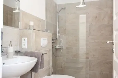 Ein Badezimmer in der Unterkunft In den Katen