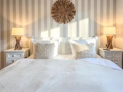Ein Bett oder Betten in einem Zimmer der Unterkunft Schatzkiste Whg 2