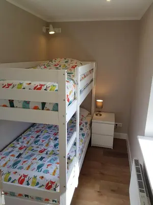 Ein Bett oder Betten in einem Zimmer der Unterkunft Haus Wellenrauschen