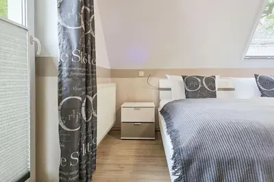 Ein Bett oder Betten in einem Zimmer der Unterkunft Seeluft
