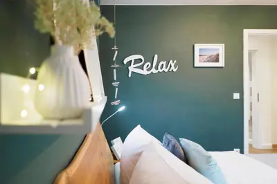 Ein Bett oder Betten in einem Zimmer der Unterkunft Haus Seeblick Whg 8