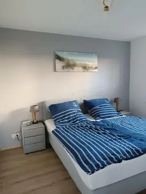 Ein Bett oder Betten in einem Zimmer der Unterkunft Ostseemeerchen