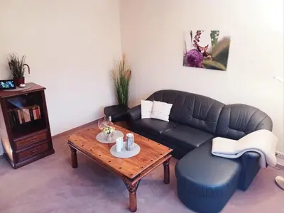 Ein Sitzbereich in der Unterkunft Maisonette Ferienwohnung - Stuth Barth