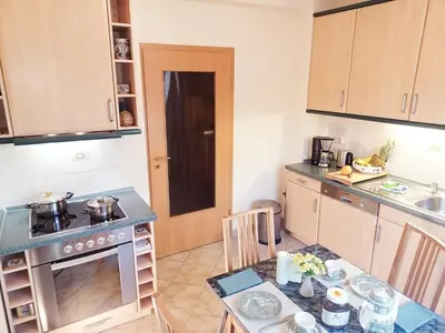 Küche/Küchenzeile in der Unterkunft Maisonette Ferienwohnung - Stuth Barth